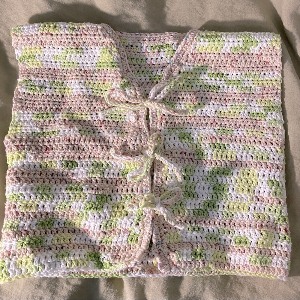Handmade crochet green tie up top with bows.